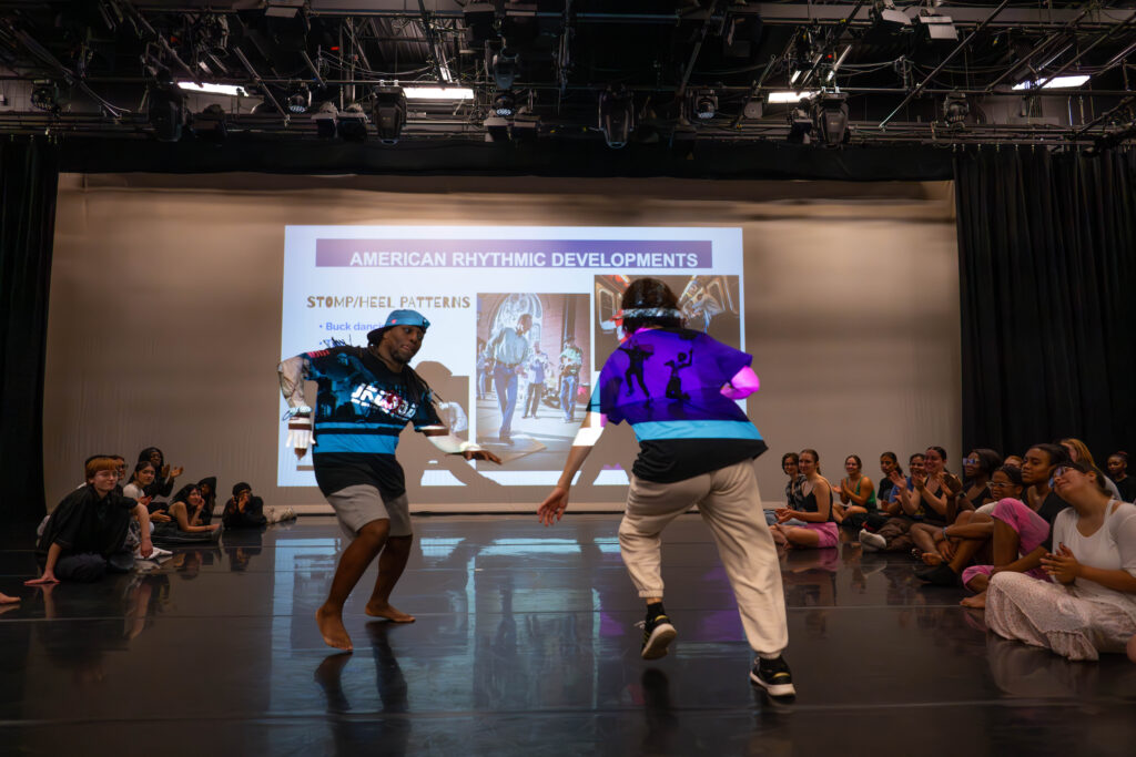 Couple dancing onstage at Columbia College Rhythm Symposium September 2024 photo by Julie Lucas